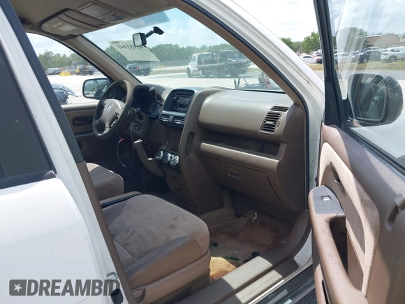 2002 Honda CR-V LX with VIN JHLRD684X2C000260, listed as a IAAI auction lot 41951045 with 270,402 mi miles and . Bid and sale history available at carsss.com. Image 5.