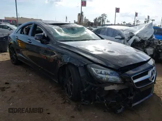 2013 Mercedes-Benz CLS-Class CLS 550 with VIN WDDLJ7DB7DA063861, listed as a IAAI auction lot 41558151 with 72,884 mi miles. Bid and sale history available at carsss.com. Image 1.