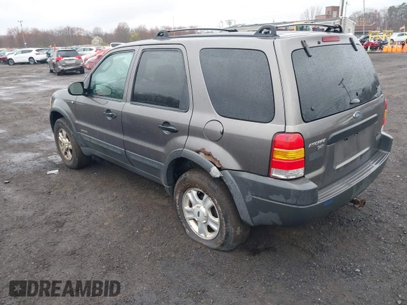 2002 Ford Escape XLT Choice with VIN 1FMYU04122KC36937, listed as a IAAI auction lot 42014887 with 141,885 mi miles. Bid and sale history available at carsss.com. Image 3.