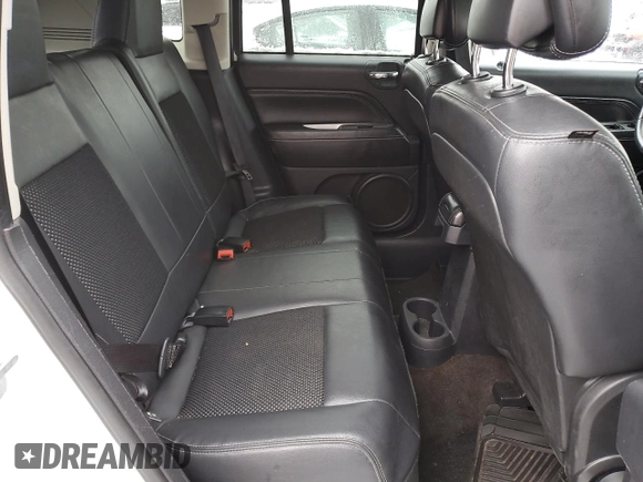 2014 Jeep Compass Latitude with VIN 1C4NJDEB9ED911237, listed as a Copart auction lot 85651674 with Not Provided miles and Salvage Title. Bid and sale history available at DreamBid. Image 11.