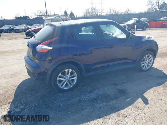 2015 Nissan Juke S with VIN JN8AF5MVXFT561176, listed as a IAAI auction lot 41797063 with 92,235 mi miles and . Bid and sale history available at carsss.com. Image 4.