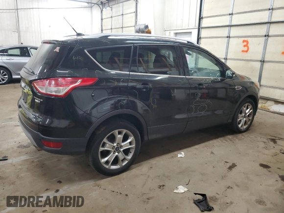 2015 Ford Escape Titanium with VIN 1FMCU9JX9FUA30970, listed as a Copart auction lot 41780275 with 106,114 mi miles and Salvage Title. Bid and sale history available at DreamBid. Image 3.