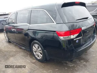 2016 Honda Odyssey EX-L with VIN 5FNRL5H65GB093937, listed as a IAAI auction lot 41691669 with 264,960 mi miles and . Bid and sale history available at DreamBid. Image 3.