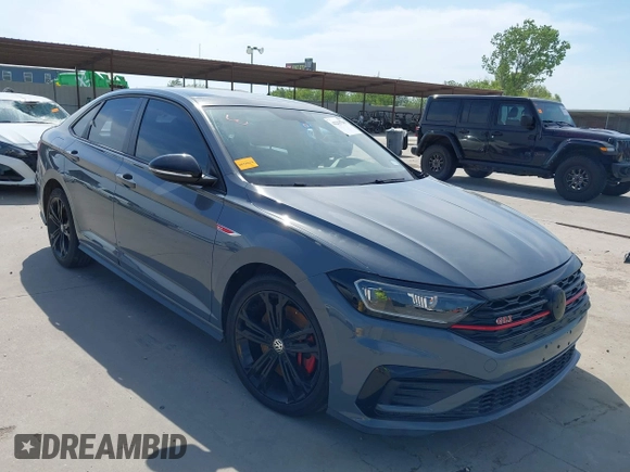 2020 Volkswagen Jetta GLI S z VIN 3VW6T7BU0LM047800, wystawiony jako IAAI lot #42263748 z przebiegiem 58 903 mil mil oraz . Historia ofert i sprzedaży dostępna na DreamBid. Obrazek 1.