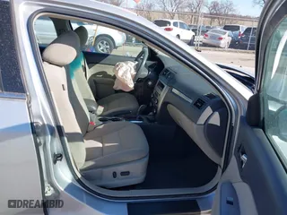 2011 Ford Fusion Hybrid with VIN 3FADP0L38BR302907, listed as a IAAI auction lot 41805491 with 197,453 mi miles. Bid and sale history available at carsss.com. Image 5.