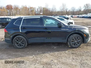 2022 Volkswagen Tiguan SE with VIN 3VV3B7AX8NM163352, listed as a IAAI auction lot 40946586 with 27,847 mi miles and . Bid and sale history available at DreamBid. Image 14.