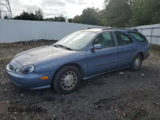 1999 Ford Taurus SE z VIN 1FAFP58S2XA261374, wystawiony jako Copart lot #74180494 z przebiegiem 193 416 mil mil oraz Szkody całkowita. Historia ofert i sprzedaży dostępna na DreamBid. Obrazek 1.