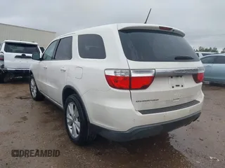 2012 Dodge Durango SXT with VIN 1C4RDHAG5CC308449, listed as a IAAI auction lot 41522856 with 111,284 mi miles and . Bid and sale history available at DreamBid. Image 3.