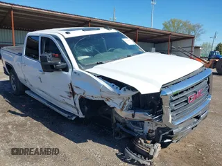 2017 GMC Sierra 2500HD SLT z VIN 1GT12TEG8HF155491, wystawiony jako IAAI lot #42122680 z przebiegiem 124 106 mil mil oraz . Historia ofert i sprzedaży dostępna na DreamBid. Obrazek 1.