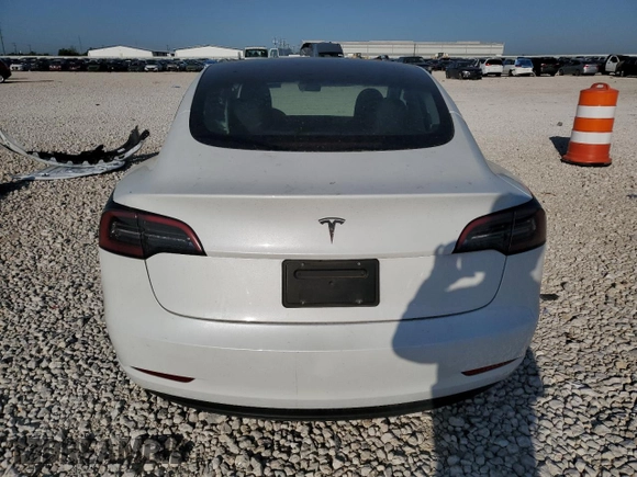 2023 Tesla Model 3 with VIN 5YJ3E1EA4PF631304, listed as a Copart auction lot 52500695 with 33,024 mi miles and Salvage title. Bid and sale history available at DreamBid. Image 6.