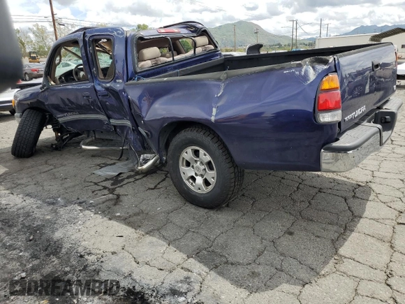 2000 Toyota Tundra SR5 with VIN 5TBRT3415YS027876, listed as a Copart auction lot 51021135 with 189,279 mi miles and Salvage Title. Bid and sale history available at DreamBid. Image 2.