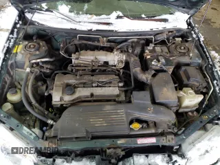 1999 Mazda Protege DX z VIN JM1BJ2220X0108600, wystawiony jako Copart lot #77004894 z przebiegiem 220 836 mil mil oraz Szkoda całkowita • Salvage title. Historia ofert i sprzedaży dostępna na DreamBid. Obrazek 11.