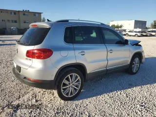 2014 Volkswagen Tiguan SE z VIN WVGAV3AX6EW549608, wystawiony jako Copart lot #48240405 z przebiegiem 81 629 mil mil oraz Szkoda całkowita • Salvage title. Historia ofert i sprzedaży dostępna na DreamBid. Obrazek 3.