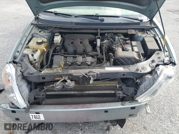 2006 Ford Five Hundred SEL с VIN 1FAFP24116G131870, выставлен на аукционе Copart как лот 53336385 с пробегом Не указан миль и Списание • Salvage title. История ставок и продаж доступна на DreamBid. Изображение 11.
