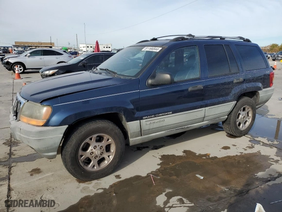 1999 Jeep Grand Cherokee Laredo with VIN 1J4GW58S0XC653687, listed as a Copart auction lot 81166844 with 252,330 mi miles and Salvage Title. Bid and sale history available at carsss.com. Image 1.