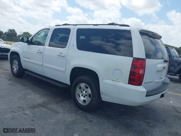 2009 Chevrolet Suburban LT w/2LT with VIN 1GNFC26JX9J108623, listed as a IAAI auction lot 42115456 with 144,370 mi miles. Bid and sale history available at carsss.com. Image 3.