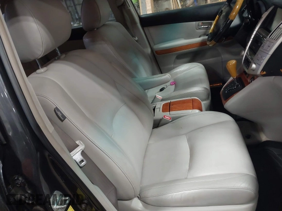 2007 Lexus RX 400h z VIN JTJGW31U172001122, wystawiony jako IAAI lot #42335831 z przebiegiem 232 699 mil mil oraz . Historia ofert i sprzedaży dostępna na DreamBid. Obrazek 5.