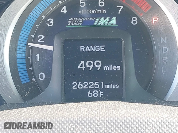 2010 Honda Insight LX with VIN JHMZE2H52AS032697, listed as a IAAI auction lot 42255794 with 262,251 mi miles and . Bid and sale history available at DreamBid. Image 15.