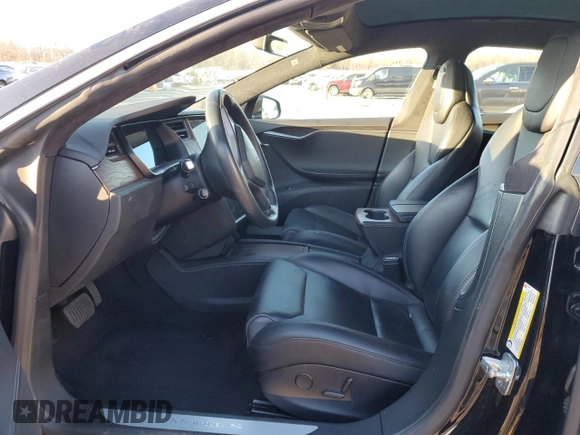 2019 Tesla Model S 75D with VIN 5YJSA1E23KF330239, listed as a Copart auction lot 86737544 with Not provided miles and Salvage title. Bid and sale history available at DreamBid. Image 7.