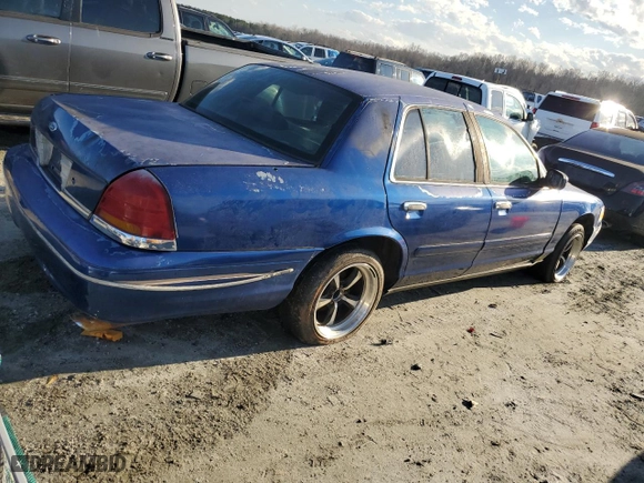 1998 Ford Crown Victoria Police Pkg with VIN 2FAFP71W5WX174213, listed as a Copart auction lot 87191094 with 288,723 mi miles and Salvage Title. Bid and sale history available at carsss.com. Image 3.