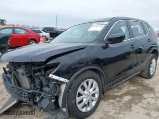 2017 Nissan Rogue S with VIN JN8AT2MT1HW138638, listed as a IAAI auction lot 41535033 with 216,712 mi miles. Bid and sale history available at carsss.com. Image 2.