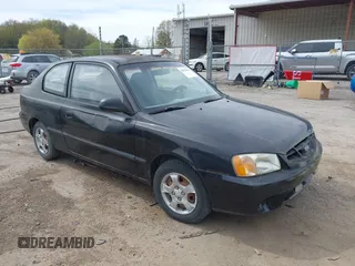 2000 Hyundai Accent z VIN KMHCF35G5YU017900, wystawiony jako IAAI lot #42063663 z przebiegiem 170 283 mil mil oraz . Historia ofert i sprzedaży dostępna na DreamBid. Obrazek 1.