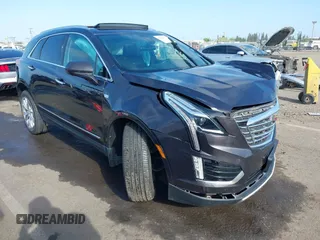 2017 Cadillac XT5 Platinum AWD z VIN 1GYKNFRS5HZ122758, wystawiony jako IAAI lot #42106771 z przebiegiem 45 762 mil mil oraz . Historia ofert i sprzedaży dostępna na DreamBid. Obrazek 1.