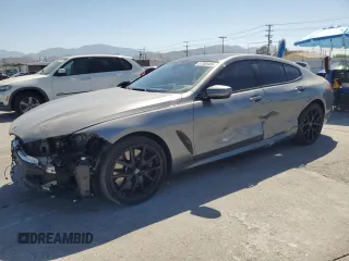 2024 BMW 8 Series 840i with VIN WBAGV2C08RCP97713, listed as a Copart auction lot 57355405 with 14,802 mi miles and Salvage title. Bid and sale history available at DreamBid. Image 1.