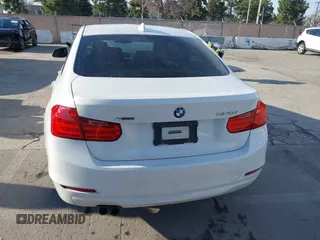 2013 BMW 3 Series 328i xDrive with VIN WBA3B5G54DNP40324, listed as a IAAI auction lot 41702014 with 126,932 mi miles. Bid and sale history available at carsss.com. Image 16.