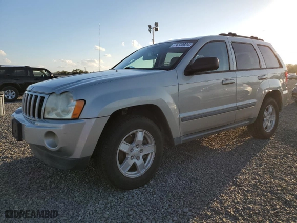 2007 Jeep Grand Cherokee Laredo with VIN 1J8HS48P97C536260, listed as a Copart auction lot 74230594 with 94,313 mi miles and Salvage Title. Bid and sale history available at carsss.com. Image 1.