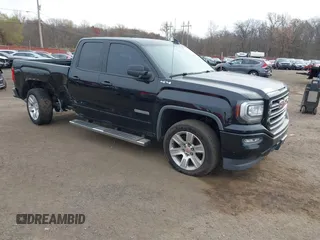 2016 GMC Sierra 1500 with VIN 1GTV2LEH9GZ421642, listed as a IAAI auction lot 40870826 with 105,326 mi miles and . Bid and sale history available at carsss.com. Image 1.