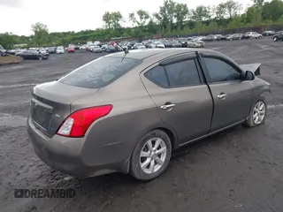 2012 Nissan Versa SV with VIN 3N1CN7AP3CL860116, listed as a IAAI auction lot 42329920 with 105,447 mi miles and . Bid and sale history available at DreamBid. Image 4.