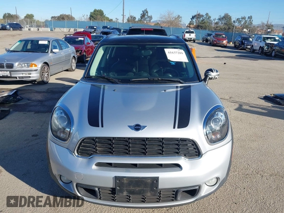 2013 MINI Countryman S ALL4 with VIN WMWZC5C58DWP30774, listed as a IAAI auction lot 41637209 with 101,540 mi miles and . Bid and sale history available at DreamBid. Image 13.
