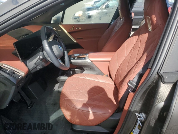 2023 BMW iX xDrive50 with VIN WB523CF0XPCL59062, listed as a Copart auction lot 43813935 with 7,788 mi miles and Salvage Title. Bid and sale history available at carsss.com. Image 7.