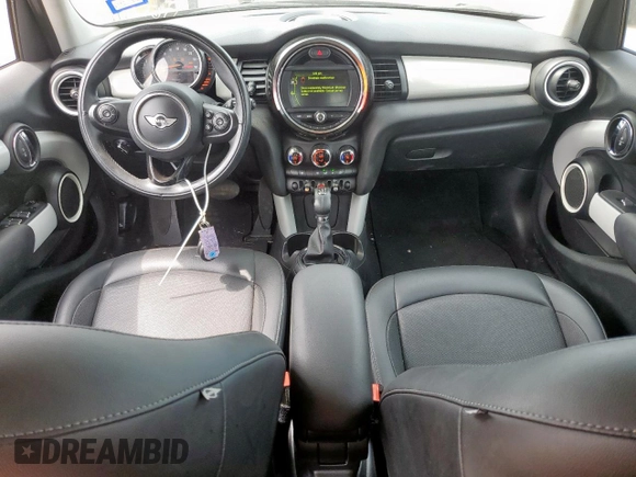 2015 MINI Hardtop 4 Door with VIN WMWXS5C51FT831167, listed as a Copart auction lot 52778685 with 52,770 mi miles and Salvage title. Bid and sale history available at DreamBid. Image 8.