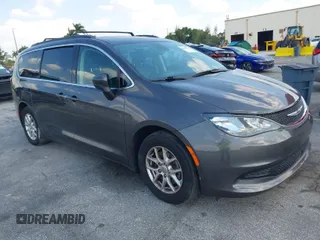 2021 Chrysler Voyager LXI with VIN 2C4RC1DG3MR565141, listed as a IAAI auction lot 42065933 with 134,138 mi miles. Bid and sale history available at carsss.com. Image 1.