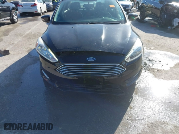 2017 Ford Focus Titanium с VIN 1FADP3J2XHL328847, выставлен на аукционе IAAI как лот 41740627 с пробегом 89 276 миль миль и . История ставок и продаж доступна на DreamBid. Изображение 17.