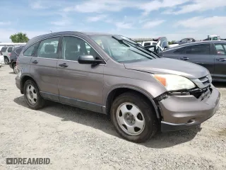 2011 Honda CR-V LX with VIN 5J6RE3H39BL018310, listed as a Copart auction lot 52604805 with 169,762 mi miles and Salvage Title. Bid and sale history available at carsss.com. Image 4.