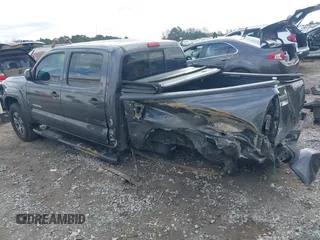 2013 Toyota Tacoma PreRunner with VIN 5TFJX4GN2DX018635, listed as a IAAI auction lot 41223225 with 275,094 mi miles and . Bid and sale history available at DreamBid. Image 3.