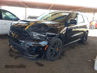 2023 Dodge Durango R/T Plus z VIN 1C4SDJCT1PC569635, wystawiony jako IAAI lot #42259684 z przebiegiem 24 148 mil mil oraz . Historia ofert i sprzedaży dostępna na DreamBid. Obrazek 2.
