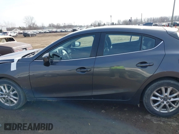 2014 Mazda 3 i Grand Touring with VIN JM1BM1M74E1212699, listed as a IAAI auction lot 41804428 with 195,472 mi miles and . Bid and sale history available at DreamBid. Image 14.