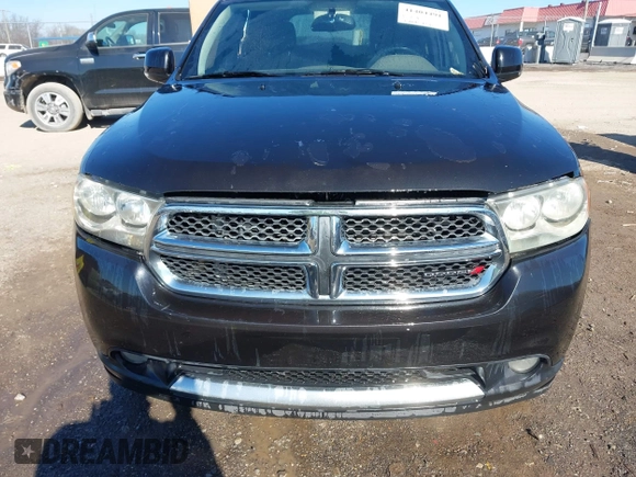 2013 Dodge Durango Crew with VIN 1C4SDHDT3DC553939, listed as a IAAI auction lot 41404491 with 148,505 mi miles and . Bid and sale history available at carsss.com. Image 12.