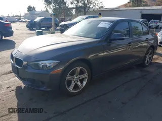 2013 BMW 3 Series 328i with VIN WBA3A5C52DJ462202, listed as a IAAI auction lot 41198588 with 145,010 mi miles. Bid and sale history available at carsss.com. Image 2.