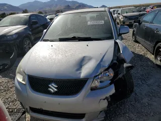 2013 Suzuki SX4 LE with VIN JS2YC5A31D6100472, listed as a Copart auction lot 73356934 with Not Provided miles and Salvage Title. Bid and sale history available at DreamBid. Image 5.