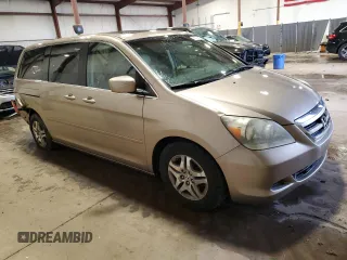 2007 Honda Odyssey EX-L with VIN 5FNRL38747B409907, listed as a Copart auction lot 52783605 with 151,225 mi miles and Salvage Title. Bid and sale history available at carsss.com. Image 4.