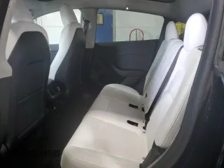 2022 Tesla Model Y Performance z VIN 7SAYGDEF7NF523532, wystawiony jako Copart lot #59949915 z przebiegiem 50 428 mil mil oraz Szkoda całkowita • Salvage title. Historia ofert i sprzedaży dostępna na DreamBid. Obrazek 11.