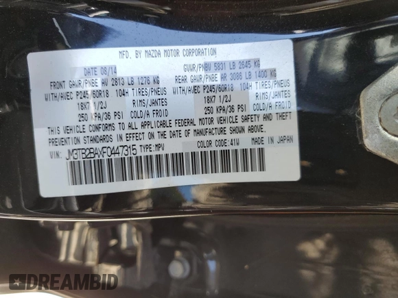 2015 Mazda CX-9 Sport z VIN JM3TB2BAXF0447315, wystawiony jako Copart lot #60842505 z przebiegiem 122 281 mil mil oraz Szkoda całkowita • Salvage title. Historia ofert i sprzedaży dostępna na DreamBid. Obrazek 13.
