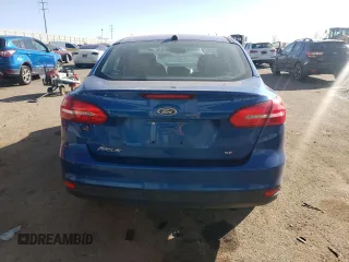 2018 Ford Focus SE z VIN 1FADP3F2XJL327387, wystawiony jako Copart lot #46927835 z przebiegiem 61 707 mil mil oraz Szkoda całkowita • Salvage title. Historia ofert i sprzedaży dostępna na DreamBid. Obrazek 6.