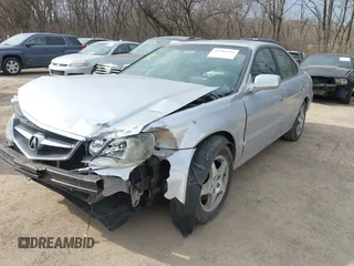 2003 Acura TL with VIN 19UUA56653A087823, listed as a IAAI auction lot 41704916 with 112,147 mi miles. Bid and sale history available at carsss.com. Image 2.