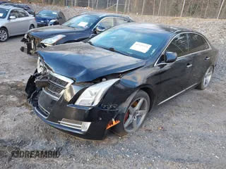 2017 Cadillac XTS Luxury with VIN 2G61M5S30H9159277, listed as a IAAI auction lot 41225371 with 125,523 mi miles. Bid and sale history available at carsss.com. Image 2.